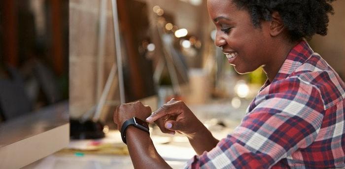 woman checking watch