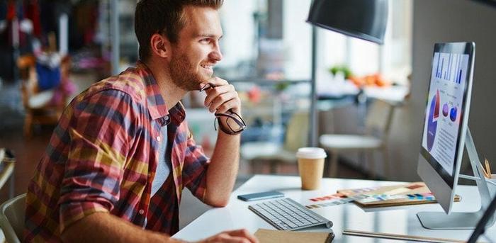 man looking at computer