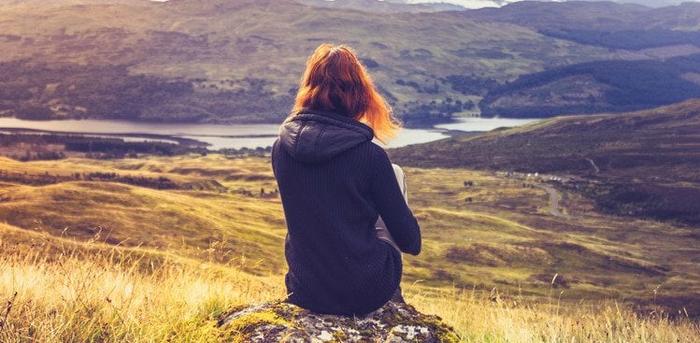 woman sitting alone