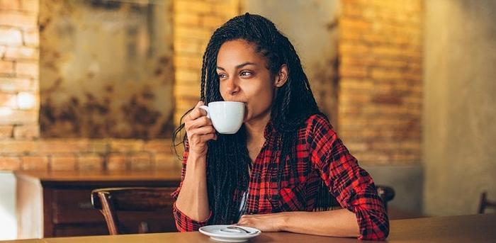 person drinking coffee