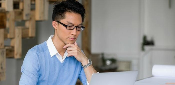 man having a difficult time at work