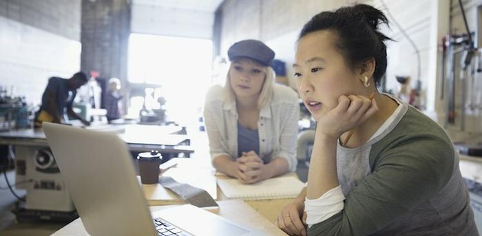 photo of girl on computer by Getty Images