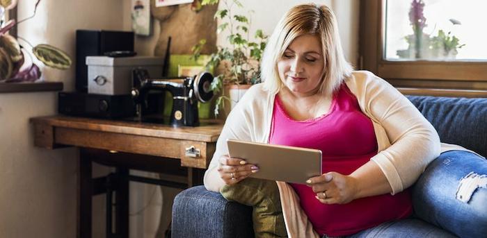 person looking at tablet