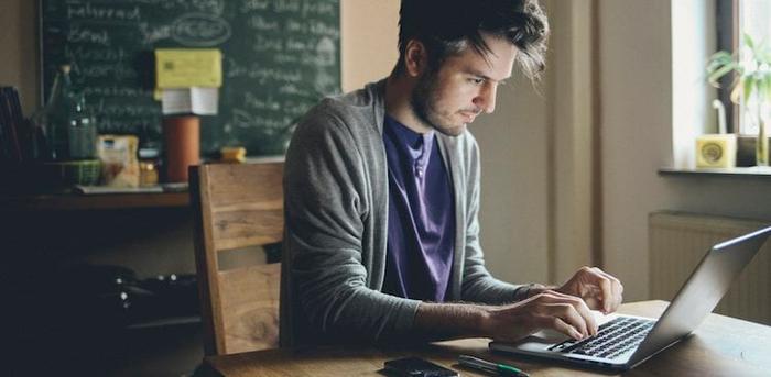 person on computer