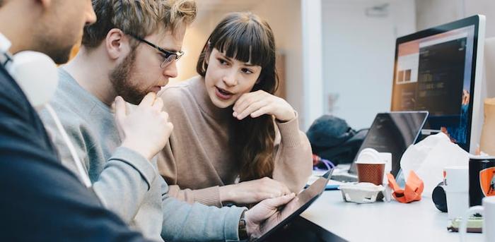 woman working with men