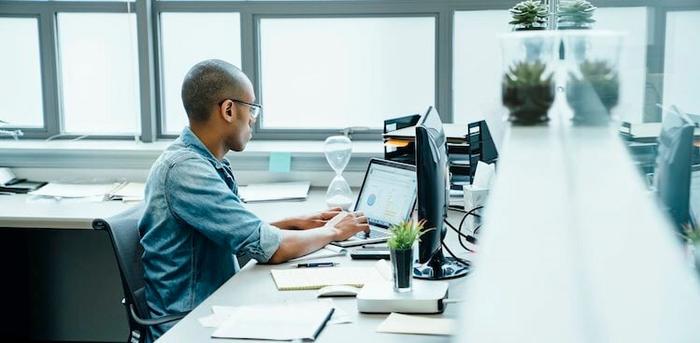 person on computer at work