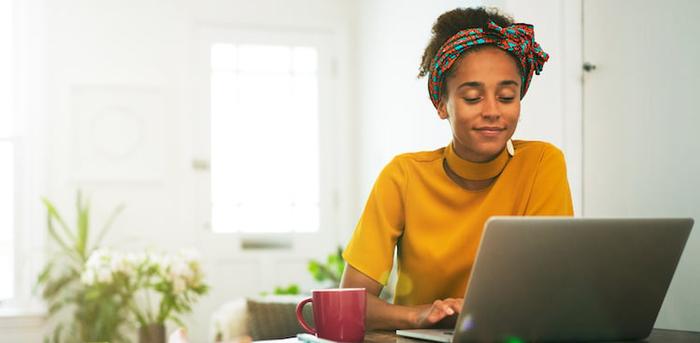 person using laptop at home