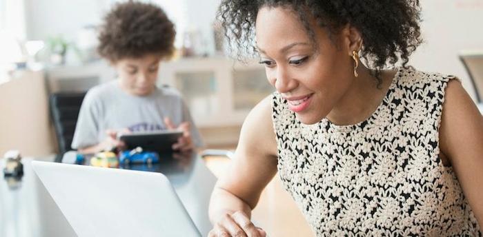 woman at home job searching courtesy Jose Luis Pelaez Inc/Getty Images