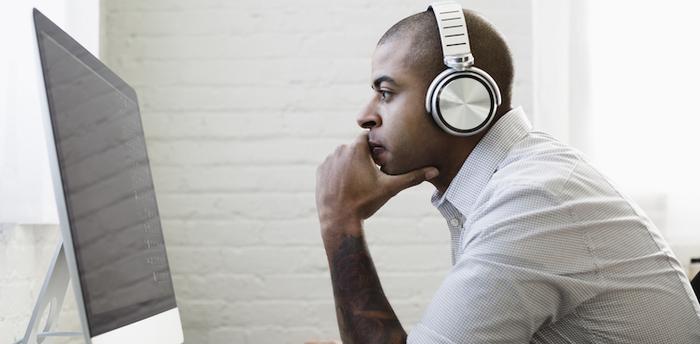 man listening to music at work