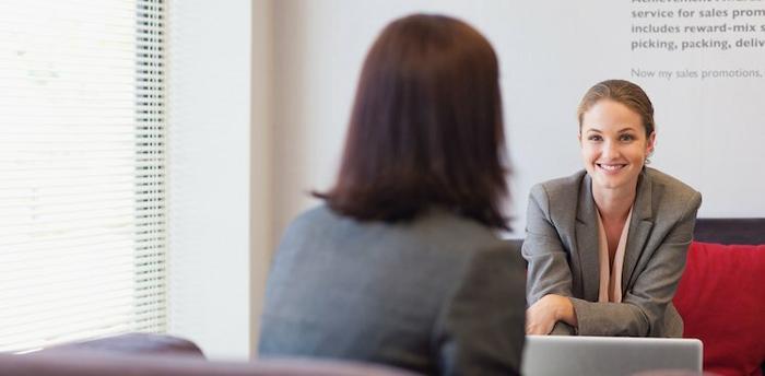 people talking in an office