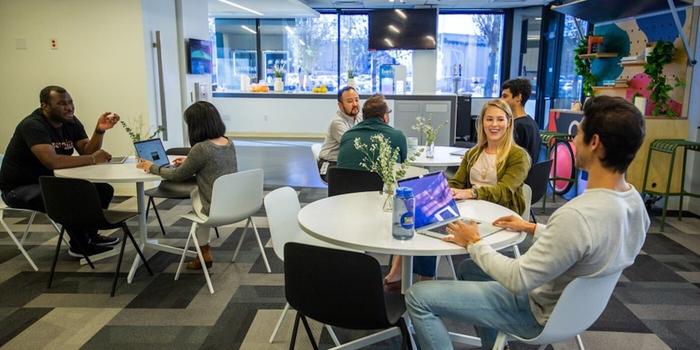 People having lunch in an office break room