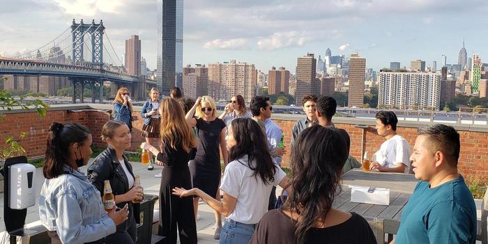 People gathered in an office rooftop terrace