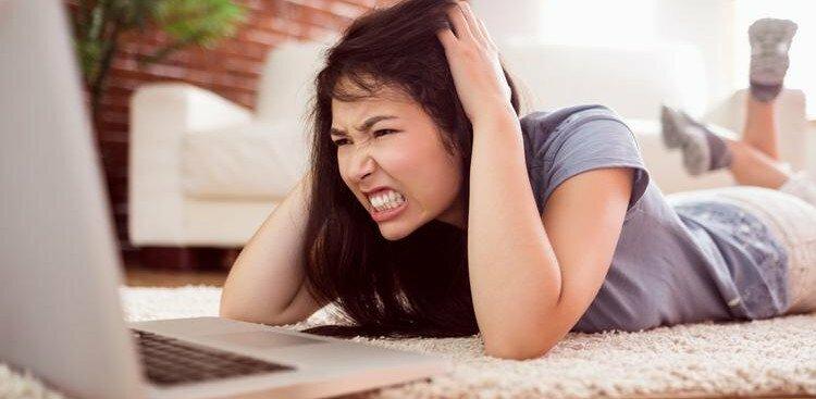 angry woman on computer