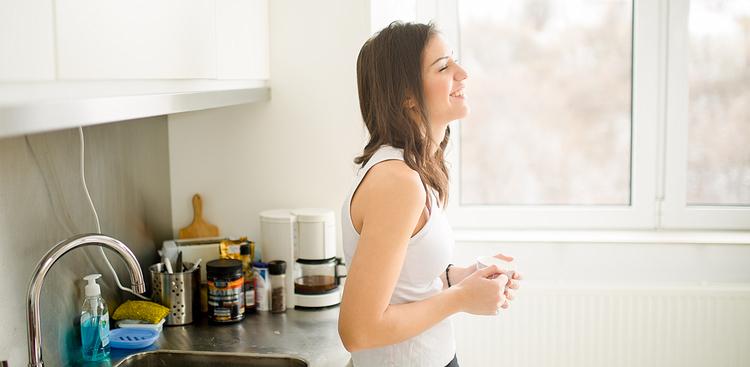 woman starting her day off in a good mood
