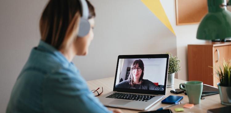 person wearing headphones on a video call