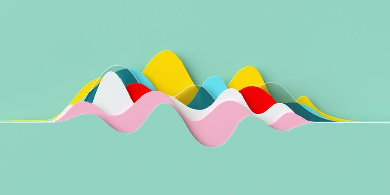 image of abstract multicolored hills or waves against a green background