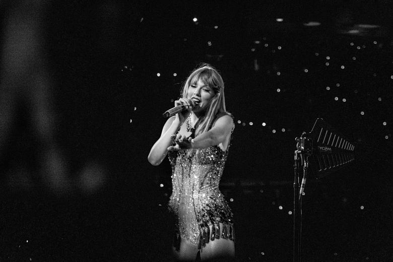 Swift sings “Love Story” to an audience member during the Fearless era. Credit: Jasmeet Sidhu