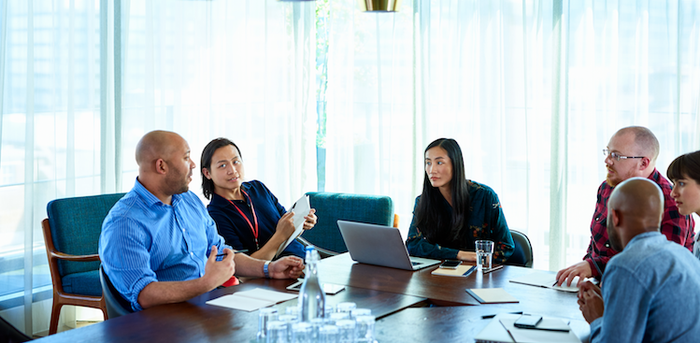 people meeting in a conference room