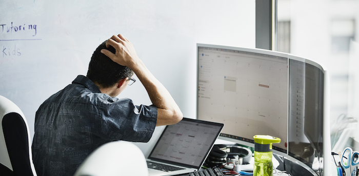 person looking at a calendar on their computer