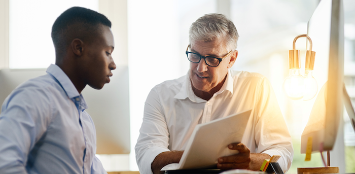 two people having a conversation at work