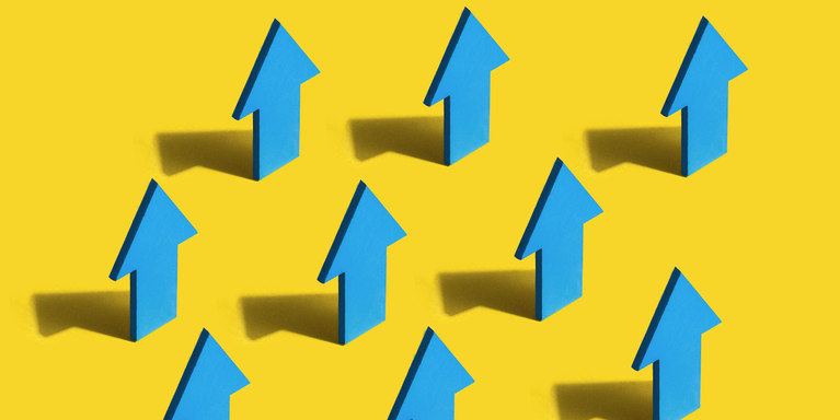 blue arrows pointing upward and casting shadows against a bright yellow background